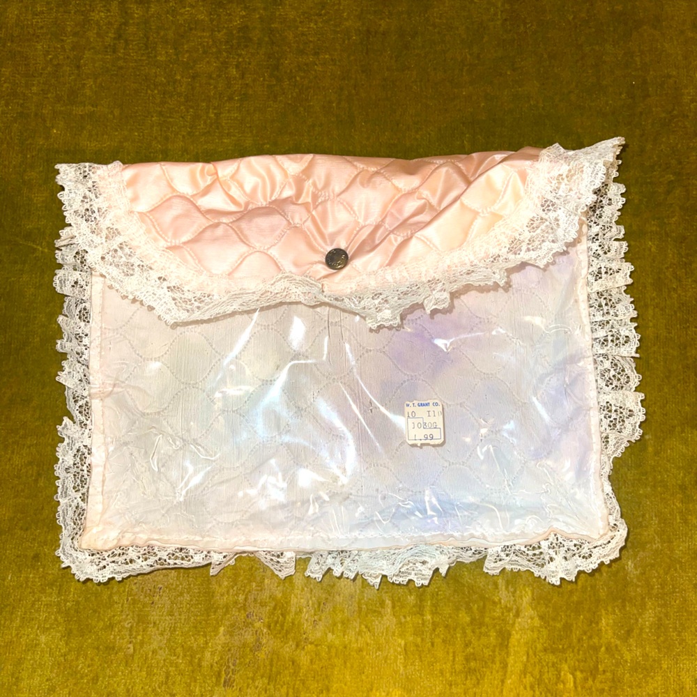 Vintage Clear Button Bag with Pink Padding.